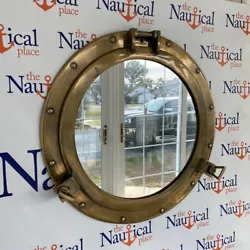 This one has an antique finish that ensures its place in any nautical decor style. This porthole has a sturdy, heavy...