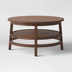•Round coffee table adds charming style to your living room layout •Crafted from sturdy wooden frame for lasting...