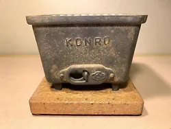 Vintage KONRO Cast Iron Portable Hibachi Barbecue Charcoal Grill Made in Japan. In good condition. Has some areas of...