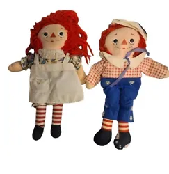 Vintage raggedy ann and andy. Damaged foot on each doll and my mom wrote my name on Ann.
