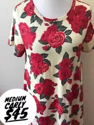 Lularoe Carly Dress. High Low hemline. This is a size medium. Carlys run big, size down at least 1. Brand new with...