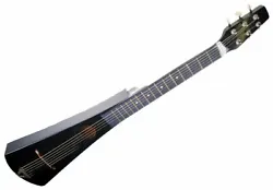 Even with its compact size it still features a 15-fret finger board. Accessory Kit Includes: Nylon Gig Bag, Strap, an...