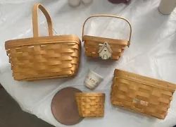 Longaberger basket and pottery lot. Good condition. No breaks or any chips. What you get is pictured. Non smoking home.