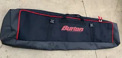 165cm with shoulder strap And Buckles. Burton snowboard padded bag. 3 zip pockets - 2 are Removable.