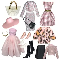 Fits Eledoll and Barbie. Everything included in FIRST photo, all clothes, shoes, accessories. Anything else shown in...