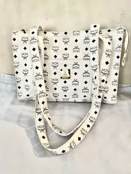 Mcm purse white w black, used Xl sz. Needs deep professional cleaning Very good condition