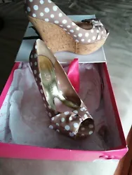 Only worn once for a special occasion, originally 49.99 beige polka dot shelly shoe. 1.5 inch platform, cork and aprox...