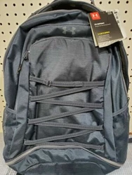 Laptop sleeve. Large, gusseted front laundry/shoe pocket placed at bottom of bag.