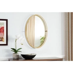 This elegant mirror is designed with an elliptical shape, making it perfect for vertical mounting and conserving wall...