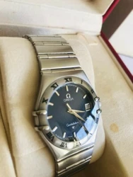 Circa: 1998. Bracelet acier.