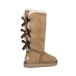 Stand proud in the Bailey Bow Tall II boot from UGG®. New Treadlite by UGG™ outsole provides increased traction,...