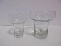 These candle holders include a small bag of wicks. This set consists of a large candle holder and one small candle...