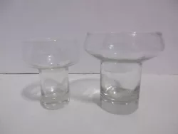 These candle holders include a small bag of wicks. This set consists of a large candle holder and one small candle...