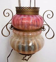 A small cut was made on the glass under the base section of the fixture where it can not be seen to allow for the power...