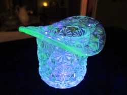 Glows under black light as pictured. They have been used.