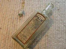 Paper label is pretty rough and incomplete but could be the missing link in an early kansas bottle collection. Its a...