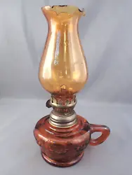 You are bidding on a very, nice, vintage, amber, glass, mini/miniature, oil lamp that stands 7 7/8