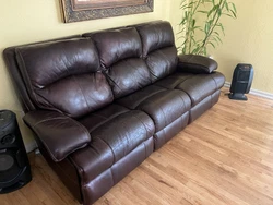 3 seater leather sofa with recliner..
