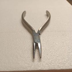 Small gauge wire bending or forming forceps.It has 2 holes for grasping!