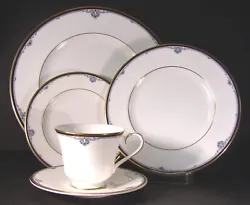 Five piece place setting in the Royal Doulton Princeton H5098 pattern. Includes dinner, salad and bread plates with cup...