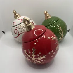 David’s Cookies Cookie Jars Christmas ornaments Red White Green And Gold. The White ornament has chips on lid. Gold...