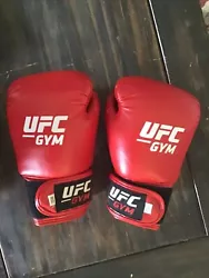 UFC Gym Youth Training Boxing Gloves (6 oz) Red. These gloves are in good condition and were rarely used.Additional...