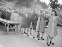 Amazing print of a rare 1948 photo of LAPD female police trainees practicing their aim with their new revolvers at a...