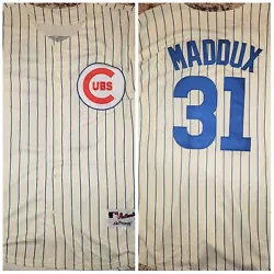 GREG MADDUX #31 THROWBACK JERSEY. WHAT YOURE SEEING IN THE PICTURES IS WHAT YOURE GETTING, SO GO THROUGH THEM ALL...