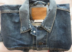 A classic.who does not love a Levi Denim Jacket. 78% Cotton 24% Lyocell.soft & comfortable fabric. Length from back...