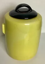 COLOR: YELLOW. THERE IS A LINE CRACK IN MOUTH OF LID. HARDLY NOTICE.