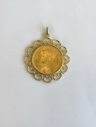 Pendentif porte piéce doccasion or 18k 9.93. grs accompagné dune piéce suisse 20f. La mise à tailles est possible...