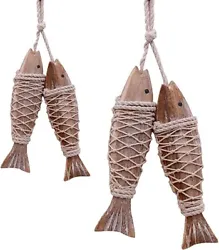 HANGIING WOODEN FISH: Wooden fish decor set includes two fish sculptures on a rope. Rustic fish decor is a perfect...