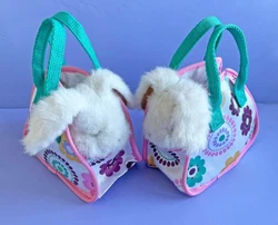 Bunny moves its head and blinks when petted and makes sounds. Like new from an adult collection. Clean, smoke free.