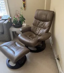 Super comfy recliner and swivel chair includes ottoman.Just don’t have room for it, in great condition with many...