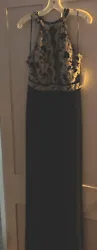 New with tags. Davids Bridal - Womens Formal Black with Gold Sequins front and back. Halter Style Size 16 NWT. Approx...