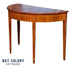 20TH CENTURY ANTIQUE FEDERAL MAHOGANY & SATINWOOD DEMILUNE CONSOLE TABLE W/ CROTCH MAHOGANY TOP & BELLFLOWER INLAYS....