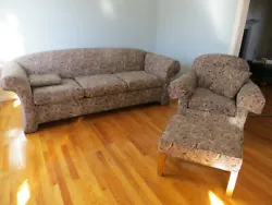 This living room set is in excellent condition. Both the matching chair and sofa have arm covers which are also in...