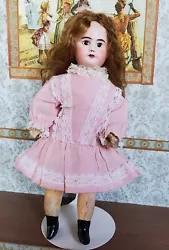 Very sweet little face on this antique French SFBJ #60 doll.   She has a mohair wig,  bisque head with painted eyes,...