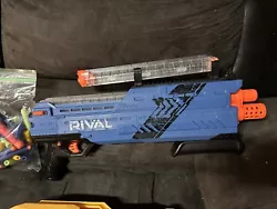 Get ready for an exciting battle with this Nerf Rival gun! Made of durable plastic, this gun is perfect for outdoor...