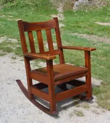 Antique Rocking Chair from the Arts & Crafts / Mission Era features solid quarter sawn oak mortise and tenon...