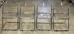 The seats are warped and need to be rewarped. If you sit on them they lay exactly as they should, but without properly...