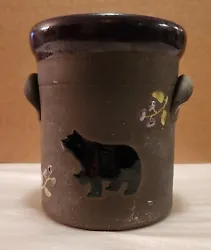 Cute canister/cookie jar with unique bear accent and flower detail.