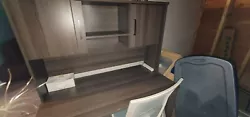 desk with drawers and hutch.