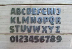 CNC plasma cut from 11 gauge mild steel, slight variations occur for each letter. They are paint-able but will rust if...