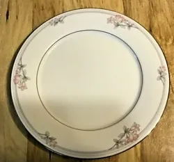 For sale is a lovely set of 12 Noritake Tarkington lunch or salad plates. Platinum edge, pink flowers and gray leaves....