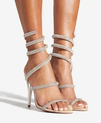 Beige faux suede wraparound rhinestone bedazzled ankle coil strappy clear heel sandal heels, SZ 7. Wraparound stiff...