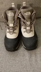 The North Face Womans Waterproof Boots. Size 7 1/2.  Bottom has winter grips and is marked Never Stop Exploring. Nice...