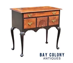 The lowboy has a scrolled out apron that we often see on Massachusetts furniture and furniture from the surrounding New...