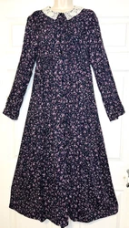 This is a gorgeous navy purple floral classic beauty dress. button front over head. slight empire waist. The perfect...