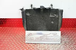08 - 16 YAMAHA R6R OEM RADIATOR. REMOVED FROM A RUNNING YAMAHA R6R. THIS WILL FIT 08 - 16 R6R. DENT ON THE RIGHT SIDE...